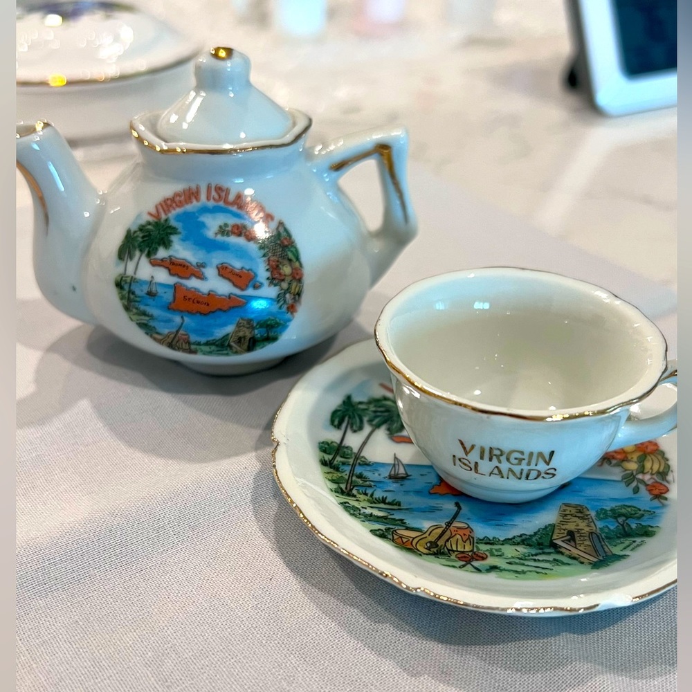 Miniature teapot, cup and saucer set